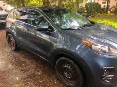 Kia Sportage in great condition. Shouldn’t need anything for safety. Summer and winter tires on rims...