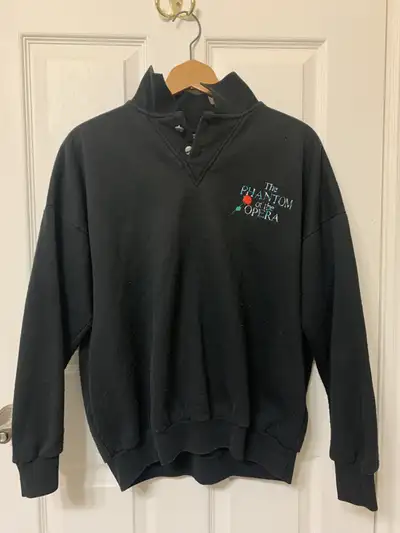 For the Broadway musical fan. A pre-loved, unisex sweatshirt in fair condition. No rip or tears but...