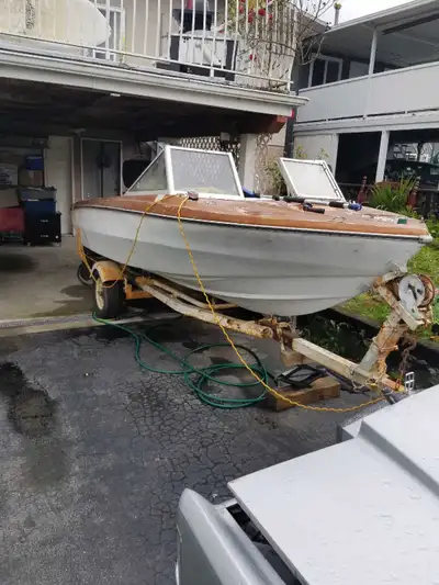 Trailer great condition, with icbc papers, boat, has inboard 4 stroke, with leg? Boat , $50. Near Ne...