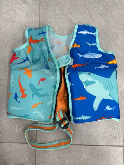 Kids swim vest, size 2-4 years. Purchased new last year, used a handful of times. Asking $10, cash o...