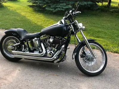 Has a black wrap. Two sets of handlebars.Runs great sounds great.