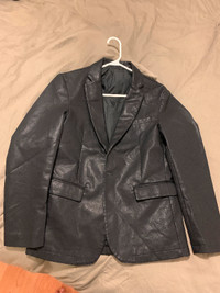 Vintage faux leather jacket. Size small. Brand new.