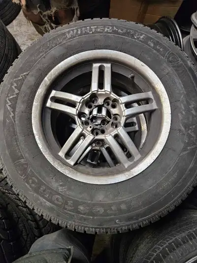 215/75R15 Firestone winter tires mounted on Aluminum rims. Set of 4 Call or text 4164591646