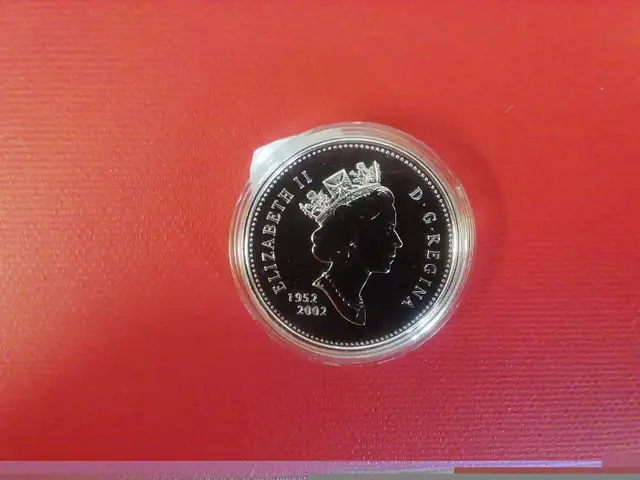 2002 Canada Silver    Dollar65048394387970121