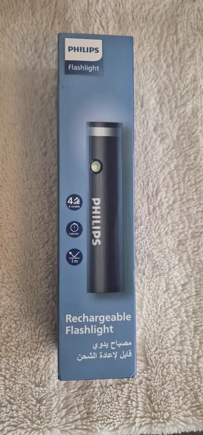 New in Factory Sealed Box. Philips Rechargeable Flashlight with Power Indicator. It has 4 Light Mode...