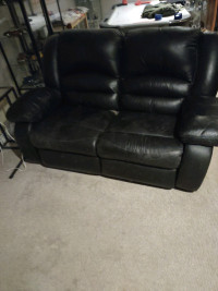 Faux leather recliner set.