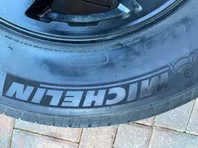 set of four 17" rims and tires 245 70 17 fits sierra silverado and chevy suv,s. two of them are wint...