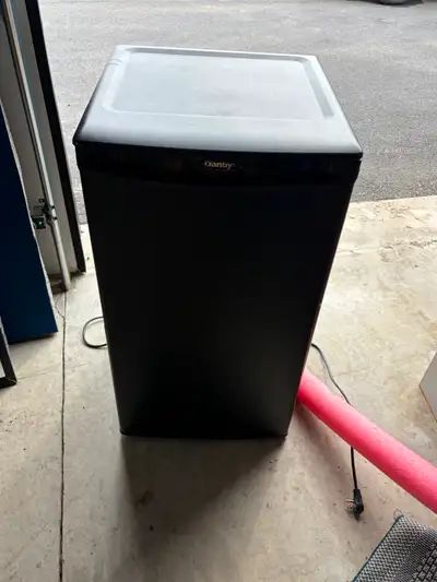 Black Danby refrigerator, works fine.