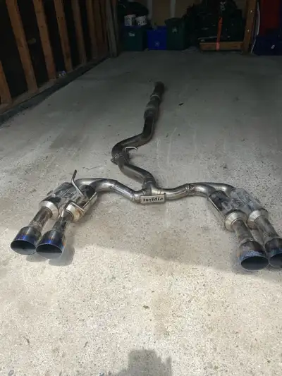 Selling a used Invidia exhaust system custom built to fit a 08-14 hatchback , which delivers enhance...