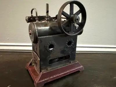 Very early steam engine with cast base Made in Germany by Ernst Plank View all photos for condition...