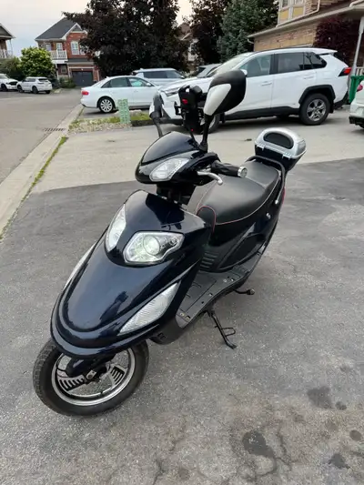 E-bike with new batteries, charger and cover. Check pictures for details.