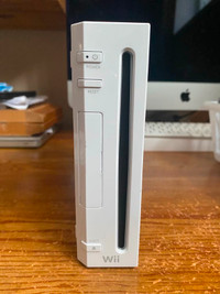 Console Wii+4 manettes originales+2 nunchuck+capteur+4 jeux