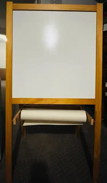 Ikea easel for kids, it is with excellent condition. My kids love to draw on the boards and the pape...