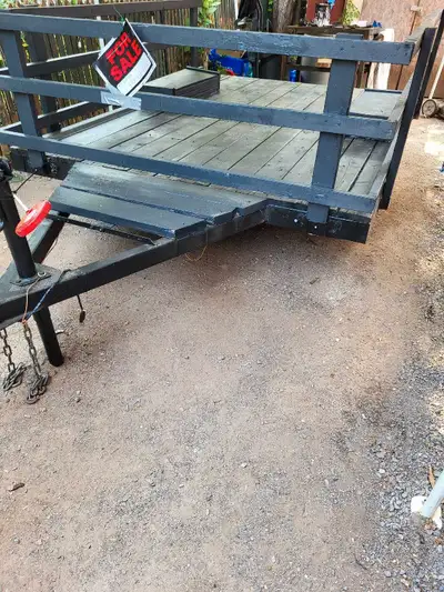 Flatdeck Utility Trailer. 106" by 76" deck size. Width between fenders is 47.5"". Can drive over fen...