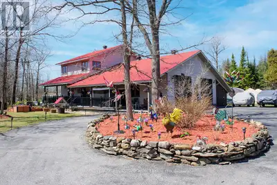 MECHANIC'S DREAM! Custom-built home (2" x 8" studs, all screwed construction, top quality windows &...