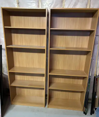 2 Ikea bookcases for sale - each measure 71 1/2 " tall, 28" wide, 10 1/2" deep. 3 shelves are adjust...