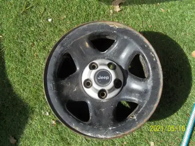 16" old style JEEP wheel with JEEP center logo 8" wide $40 or best offer, CASH only.