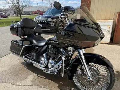 2011 Road Glide with 59600miles. Rinehart pipes, removable tour pack, spoke rims, lots of chrome. As...