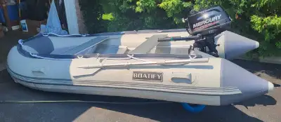 Boat with Mercury motor 5HP 4 stroke. 12 feet long.