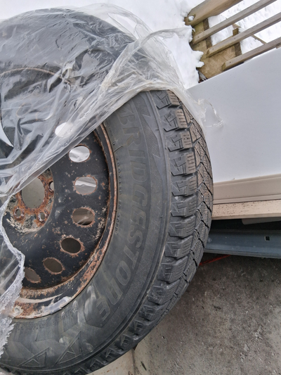 Blizzak DM-V 225/65R17 on steel rims. Great tires and rims set for the ice and snow for about 1/2 th...