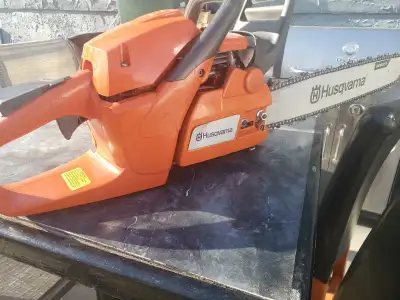 Husqvarna 455 Rancher chain saw, View more