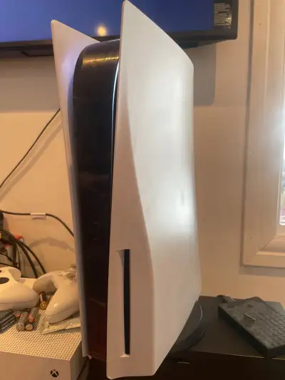 PS5 with controller and games, View more