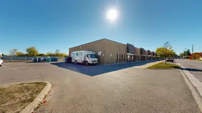 RARE OPPORTUNITY! Unit 18 at 540 Clarke Road offers a total of 3400 Square Feet. 2,600 SF of versati...