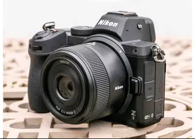 Nikon Z5 with 40mm f2 and smallrig L bracket, View more
