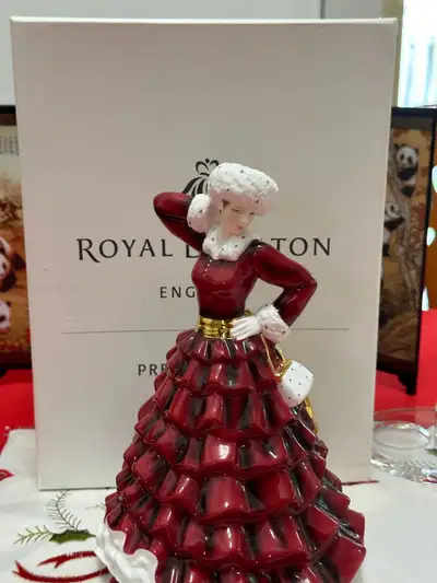 Pretty Ladies Christmas Day 2009 Royal Doulton Bone China figurine w/ Box . Or Xmas Day 2009 discont...
