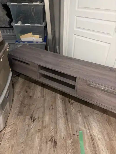  Beautiful gray TV stand in mint Condition with silver  legs, View more