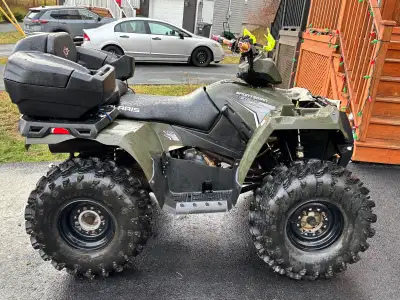 Great working machine , oil changes regularly. Two up seat with cargo box , 31” Tires with on demand...