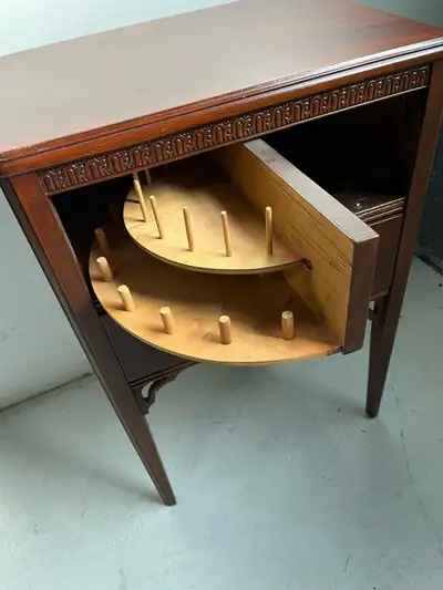 Vintage sewing accessories table, View more