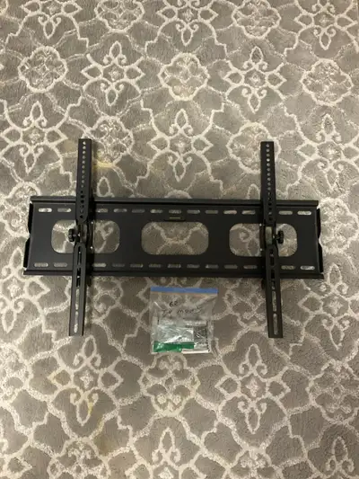 This used ONN TV mount is perfect for mounting your television securely and safely! It comes with al...