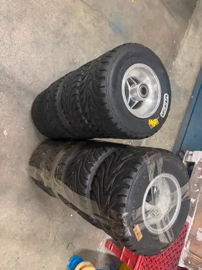 Have 2 sets of rain tires on rims, one set is MG tires and other is Vega. Price is $250 Per set.