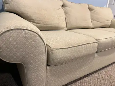 Matching sofa and loveseat in good condition. Relax and unwind in this comfy set.