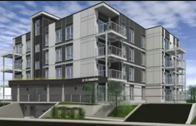 Grand 3 1/2 + bureau (chambre invité ) Lévis centre-ville. 4 ème et dernière étage. Vue sur Québec....