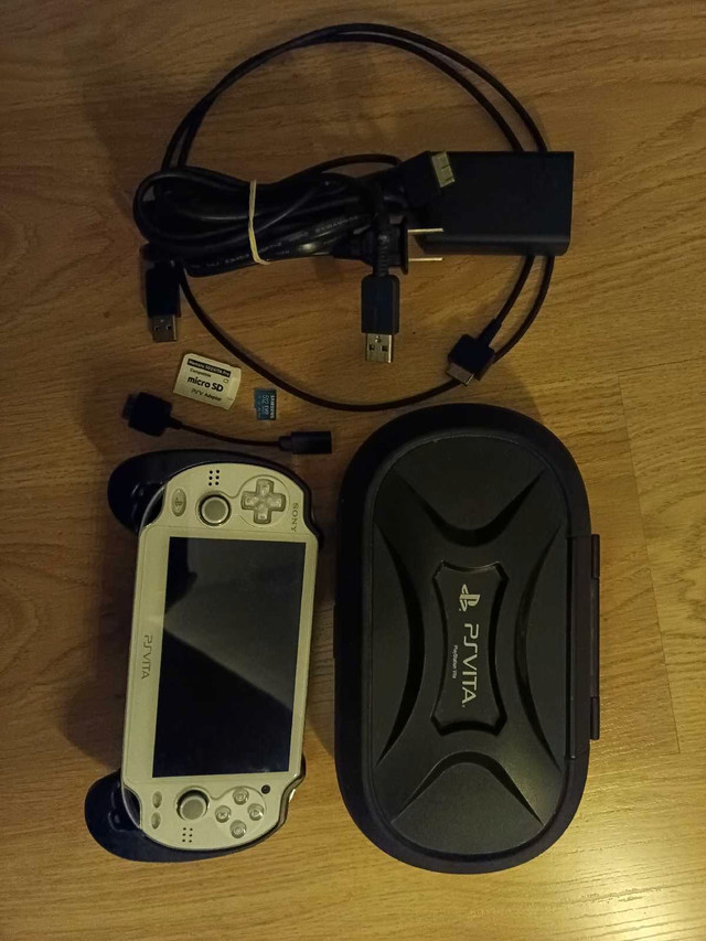"hacked" 512gb PS Vita OLED, loaded with games and accessories in Sony PSP & Vita in Strathcona County