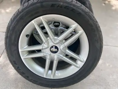 Nice BBS silver rims with Eagle Sport 225/ 50/16 like new rubber.
