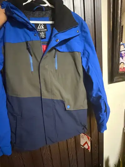 Ripzone winter sports jacket in blue, grey, and navy blue., View more