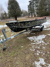 12.5 foot boat with 15 hp Johnson 