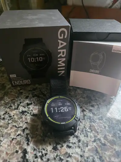 Garmin Enduro smartwatch for sale. Great condition, comes with original box, user guide and charge c...