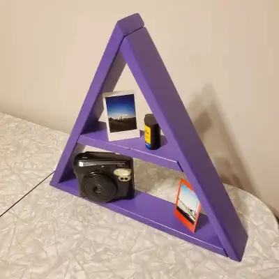 Pine triangle shelf with glossy grape purple spray paint. H: 14.5" x W: 16.5" x D: 2.5" Made by Gonz...