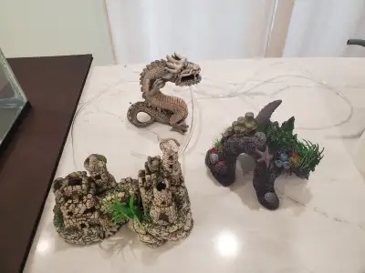 Aquarium figurines - Castle 9 inches long, 7 inch high - 20$ , Sunken Chest 5" long, 3" wide - $10 C...