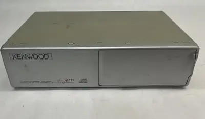 This is a used Kenwood KDC-C603 10-Disc CD auto changer with digital pulse axis control and 1-Bit 4...