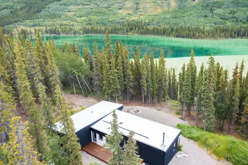 Escape to ultimate solitude just 45 minutes from Whitehorse with this stunning Scandinavian-inspired...