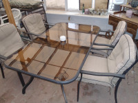 4 chair patio set with 2 captain chairs   300.00