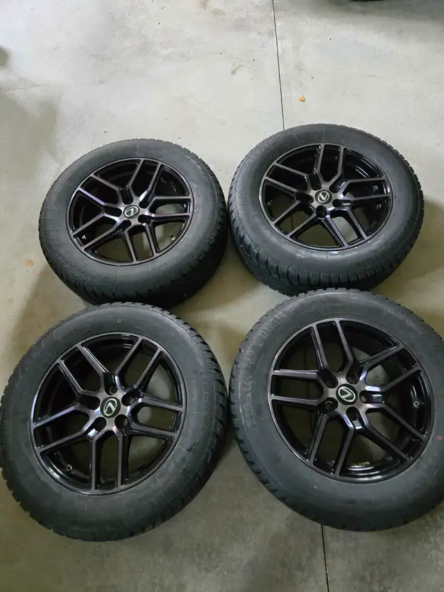 225/65R17 Uniroyal Tiger Paw winter tires on rims in Tires & Rims in Stratford - Image 2