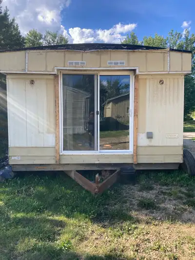 14 foot by 64 foot 1978 mobile home to be moved , on blocking and ready to go , new furnace some har...