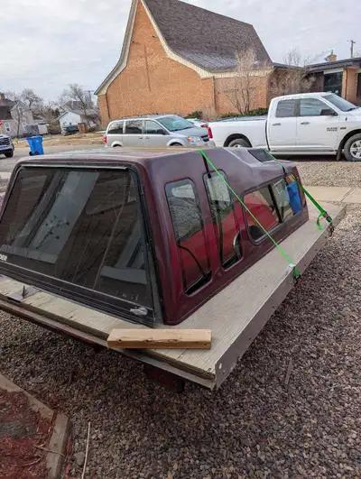 Truck box topper. Was on a 94 Chevy. Got pictures of the dimensions in the pictures. In good shape....
