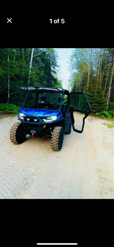 3000km just hunting and fishing km’s Upgraded 30” carnivore tires Poly window front/back Can am poly...
